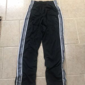nike sweatpants with buttons on the side